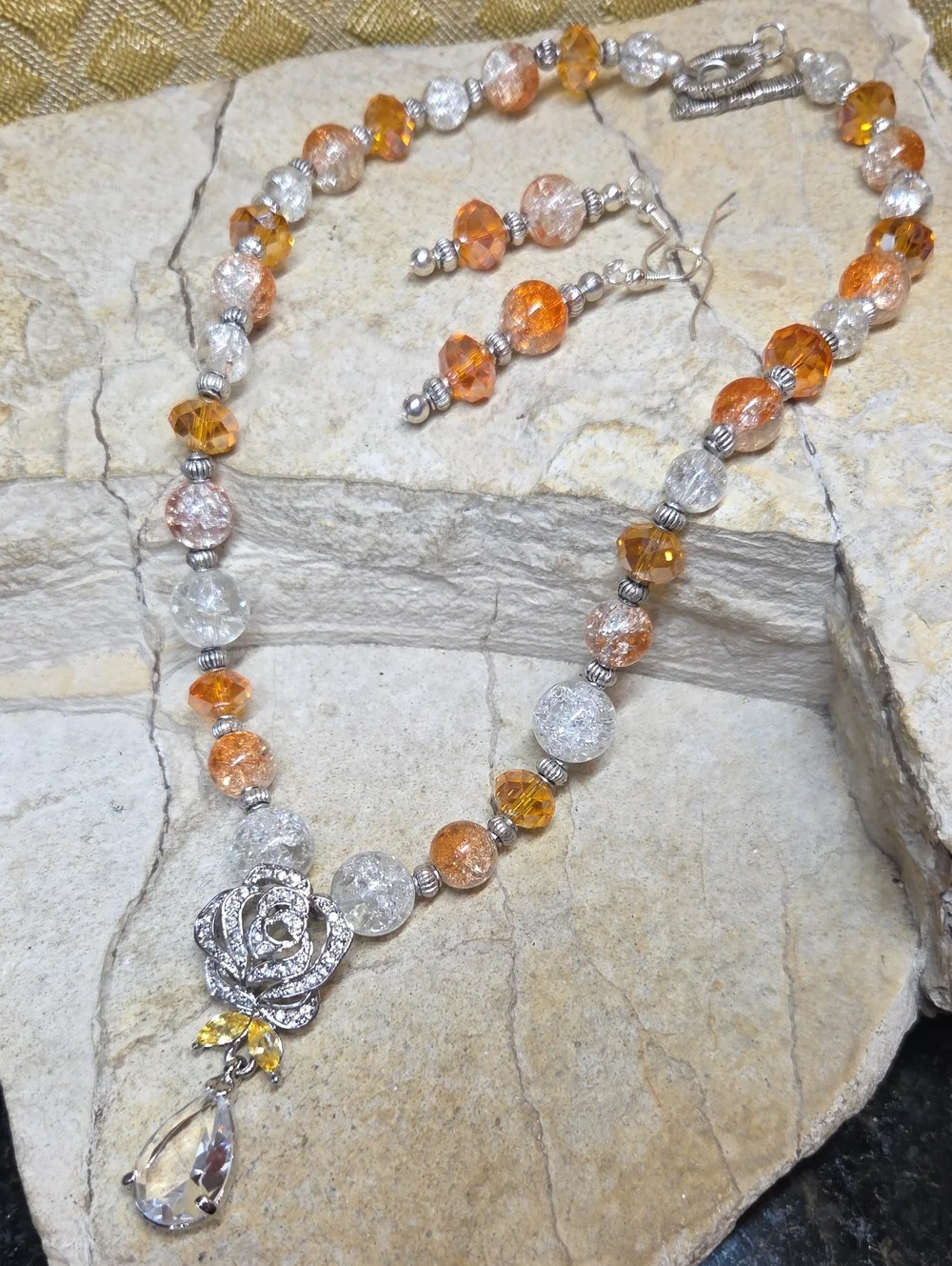 Elegant Rose Pendant Necklace and Earrings Set in Orange and Clear Glass Crystal